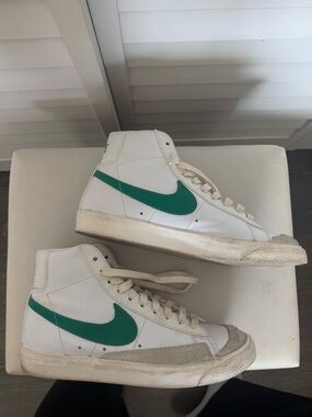 Nike White High-Top Sneakers with Green Swoosh